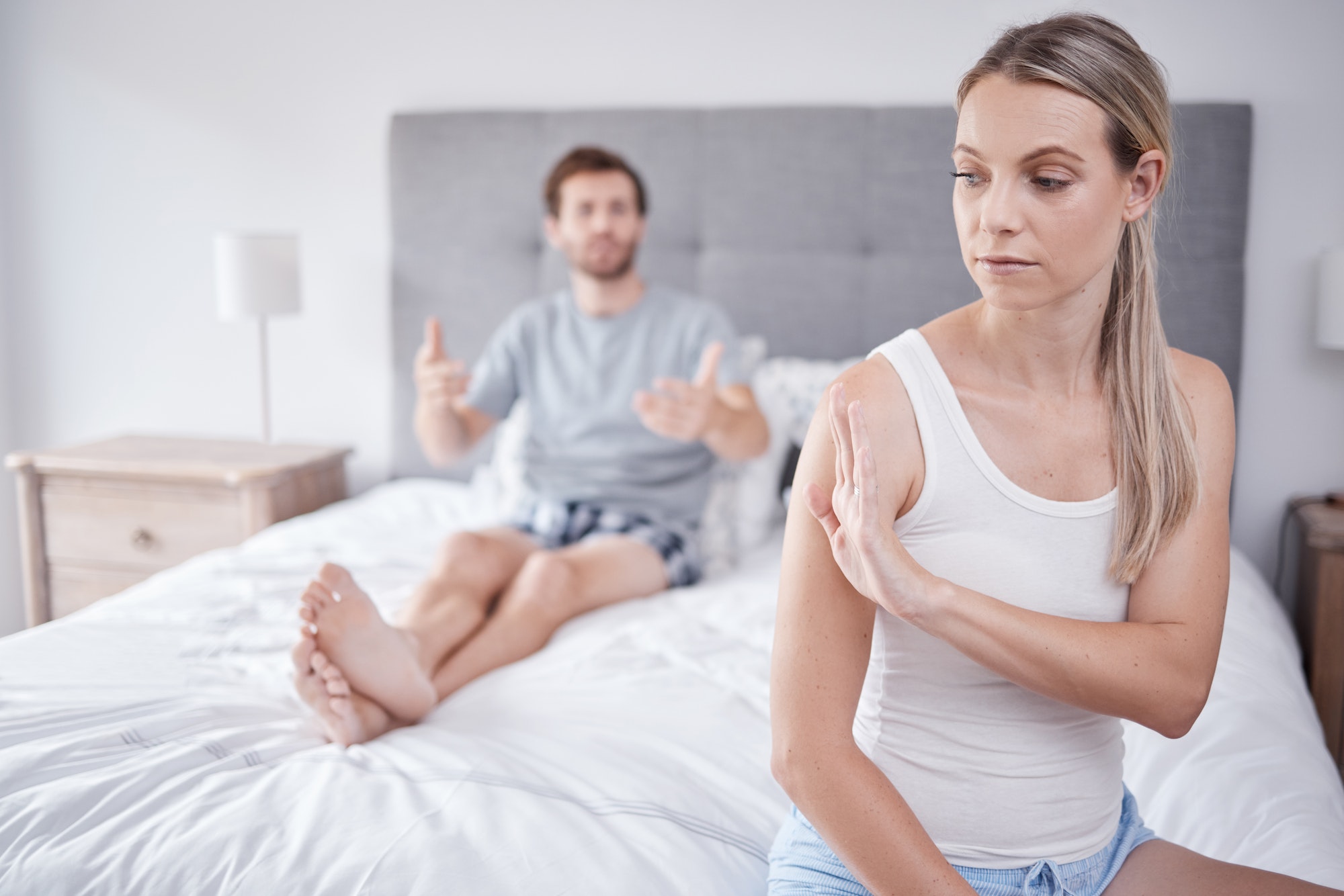 mental health, stress and a couple fight in bedroom in the morning due to bad marriage. Toxic relat